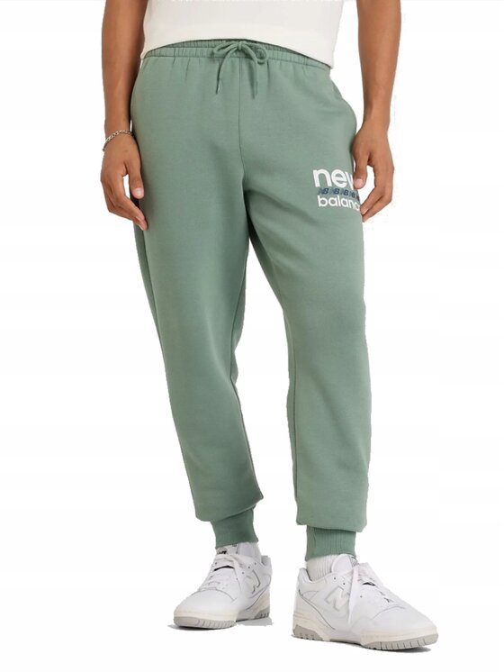 New Balance New Balance Spodnie dresowe MP51940DKJ Zielony Standard Fit
