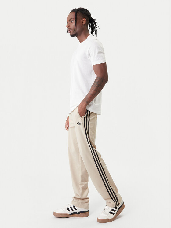 adidas adidas Dressipüksid Firebird KE6679 Beež Loose Fit
