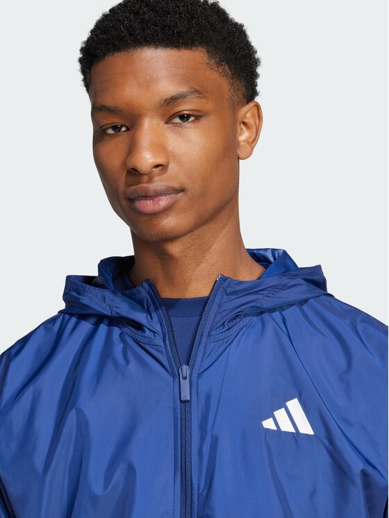 adidas adidas Kurtka anorak 140923 Niebieski jasny Regular Fit
