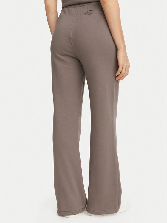 Calvin Klein Jeans Calvin Klein Jeans Spodnie dresowe Monogram LV047H220G Beżowy ciemny Regular Fit