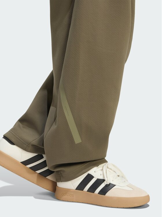 adidas adidas Spodnie materiałowe Z.N.E. OPEN HEMZ.N.E. OPEN HEM Zielony Loose Fit