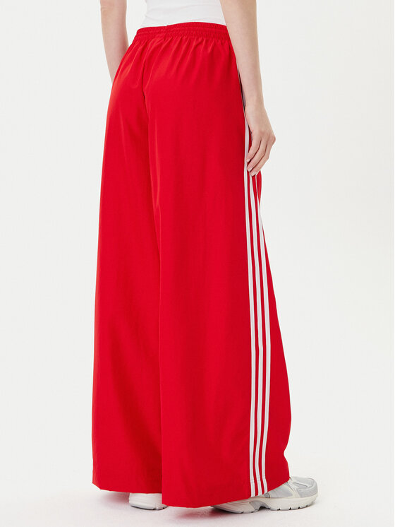 adidas adidas Melegítő alsó adicolor Firebird JD3388 Piros Loose Fit