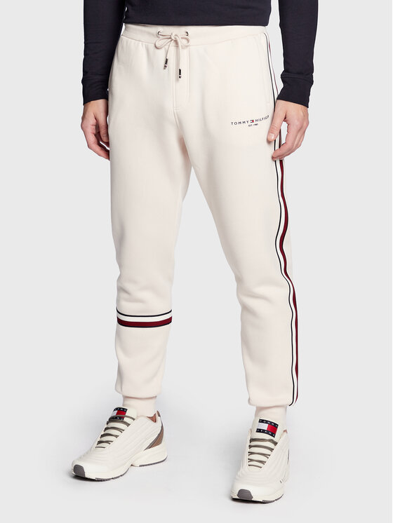 Tommy Hilfiger Spodnji del trenirke New Global Stripe MW0MW29461 Bež Regular Fit