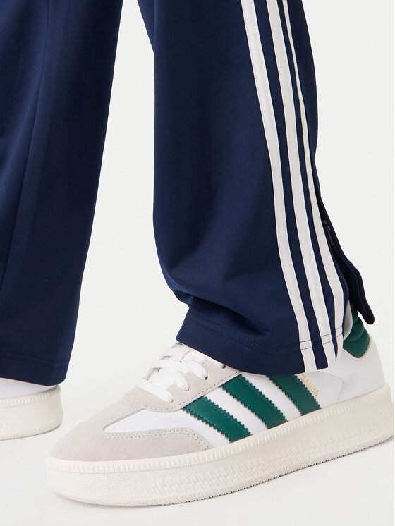 adidas adidas Spodnie dresowe Firebird KD8316 Granatowy Loose Fit