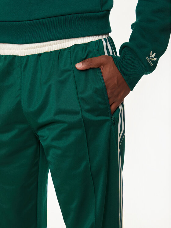 adidas Spodnie dresowe IS1402 Zielony Regular Fit | Modivo.pl
