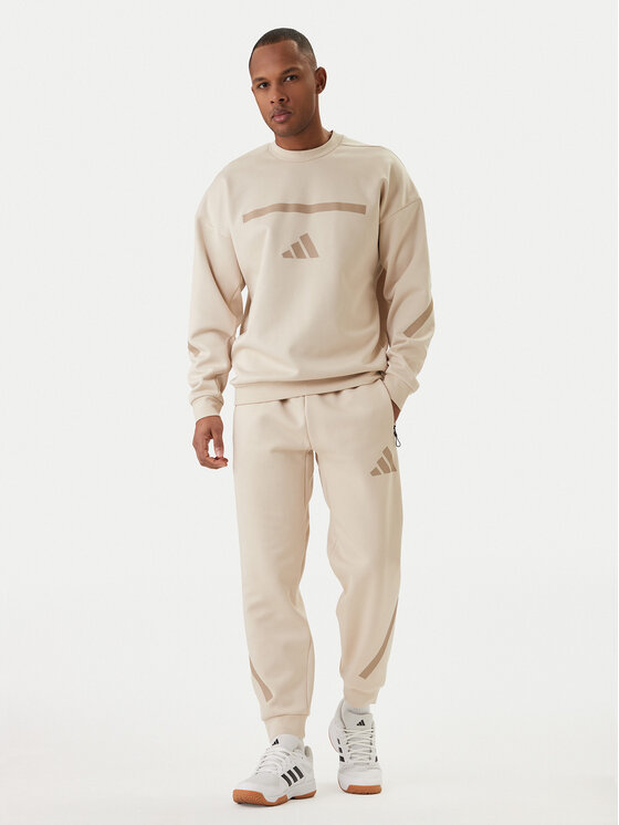 adidas adidas Spodnji del trenirke Z.N.E. KE4684 Bež Regular Fit
