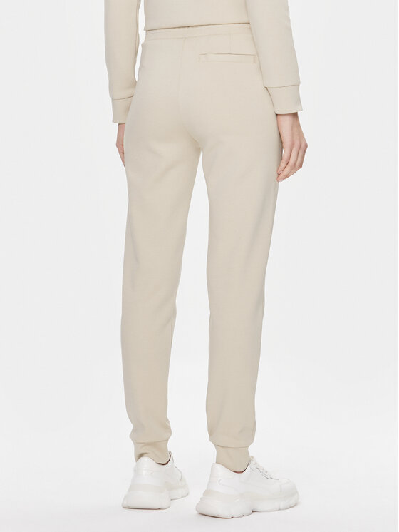Calvin Klein Calvin Klein Spodnie dresowe Micro Logo Essential K20K204424 Beżowy Slim Fit