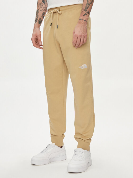 The North Face Pantalon jogging Nse Light NF0A4T1F Beige Regular Fit Modivo