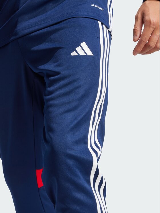 adidas adidas Spodnie materiałowe 139461 Niebieski jasny Slim Fit
