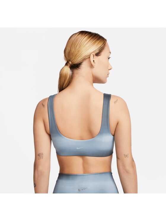 Reggiseni sportivi sales nike grigio