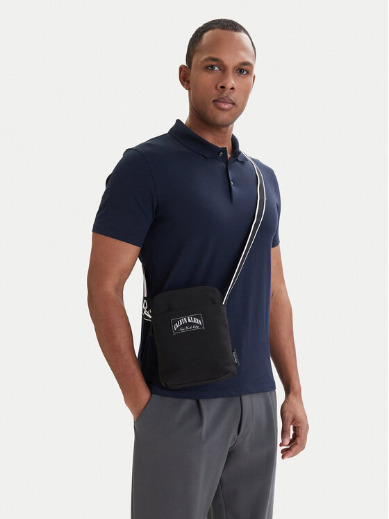 Calvin Klein Calvin Klein Ľadvinka Graphic Capsule Reporter LV04D3346G Čierna