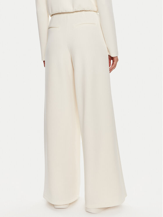 Guess Guess Spodnie dresowe Olympe V4YB07 KCAY2 Beżowy Relaxed Fit