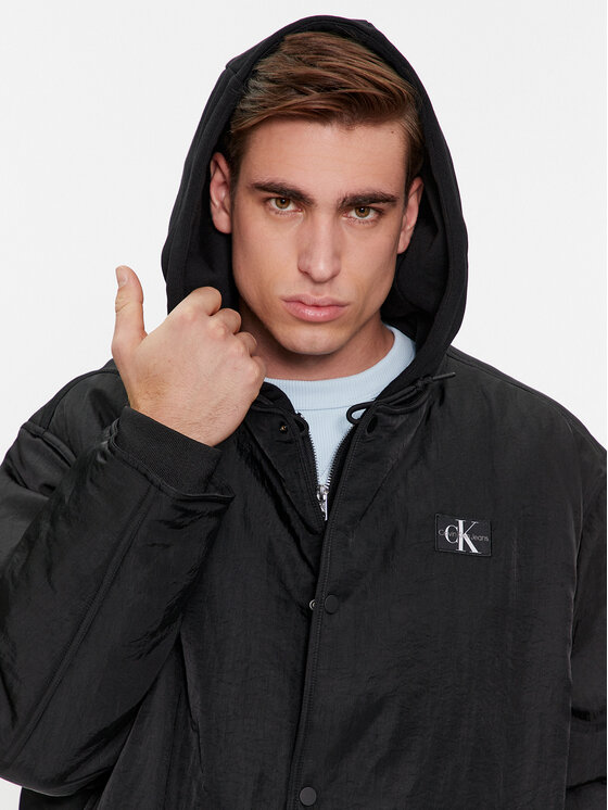 Calvin Klein Jeans Calvin Klein Jeans Prechodná bunda Skater Hooded Jacket J30J325290 Čierna Regular Fit