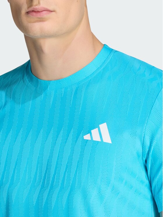 adidas adidas Koszulka techniczna CLIMACOOL+ AIRCHILL FREELIFT Turkusowy Slim Fit