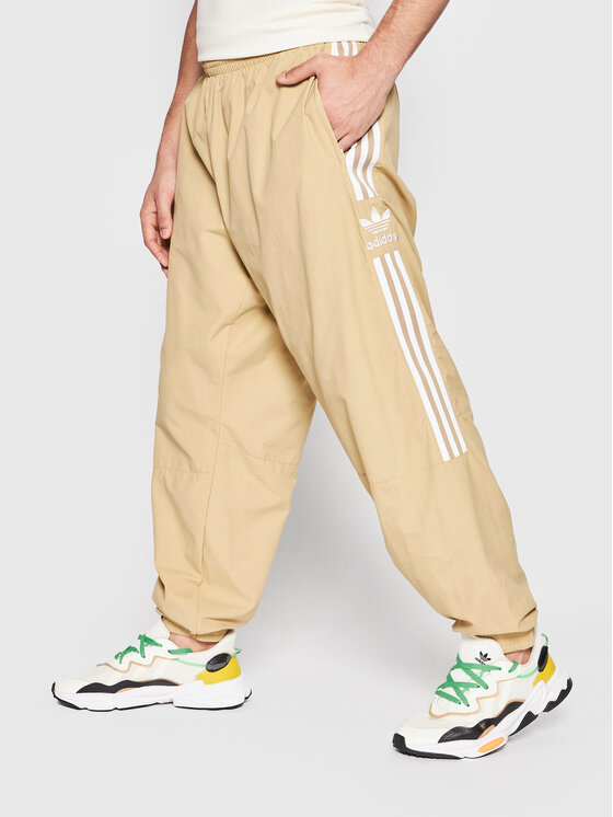 adidas adidas Παντελόνι φόρμας adicolor Classics Lock-Up Trefoil H41385 Μπεζ Regular Fit