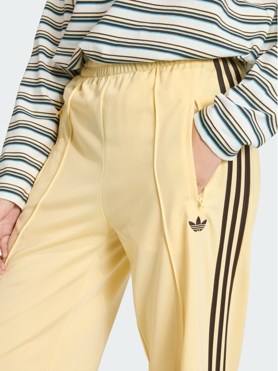 adidas adidas Spodnie dresowe FB TP LOOSE Pomarańczowy Loose Fit