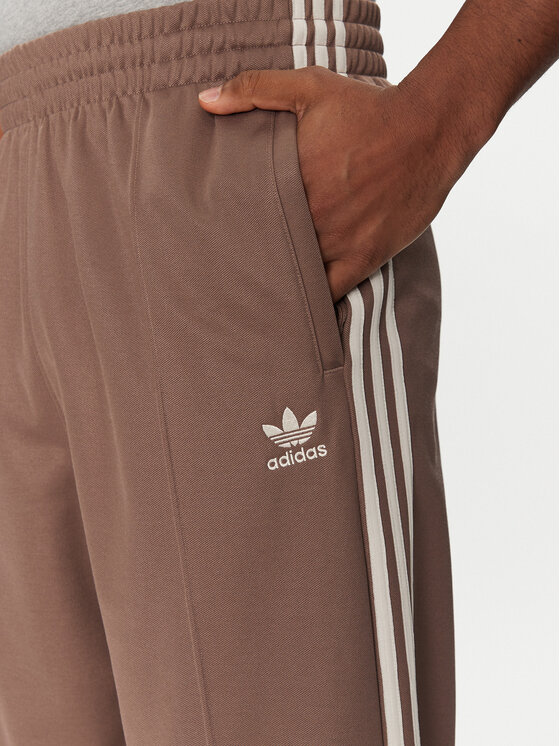 adidas adidas Donji dio trenerke adicolor Firebird JP1067 Bež Baggy Fit