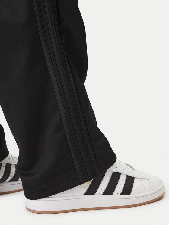 adidas adidas Spodnji del trenirke adicolor KE3500 Črna Loose Fit