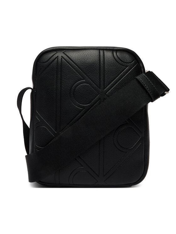 Calvin Klein Calvin Klein Somiņa Emblem Aop Emboss Reporter LV04D3331G Melns