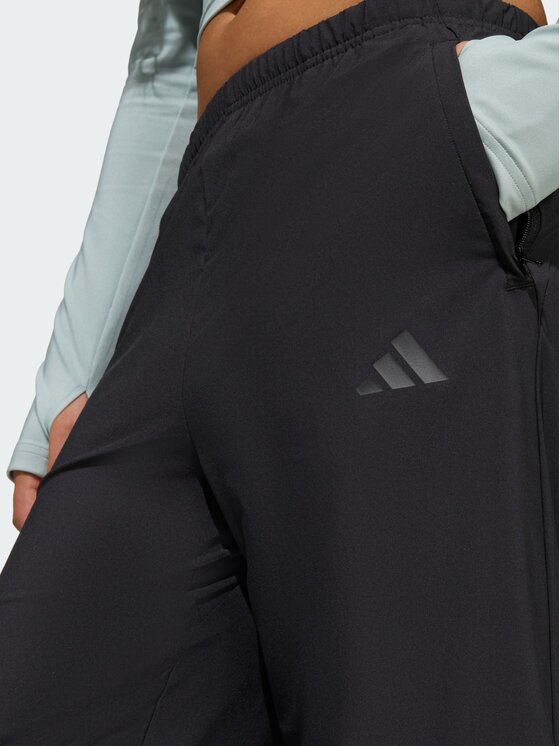 adidas adidas Spodnie materiałowe FUTURE ICONS Czarny Loose Fit