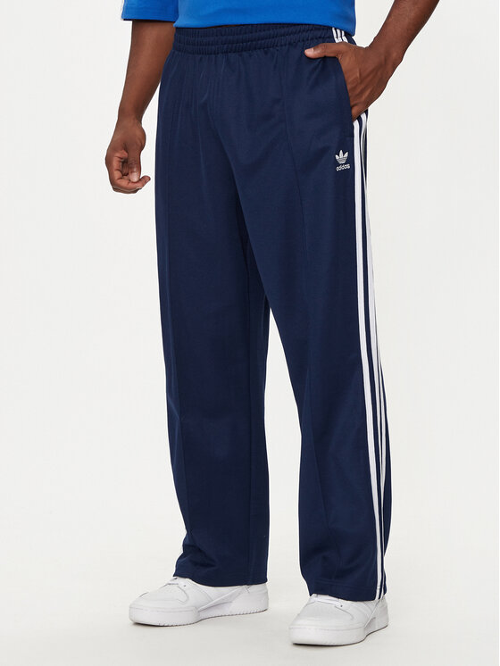 adidas adidas Melegítő alsó adicolor Firebird IZ2466 Sötétkék Baggy Fit