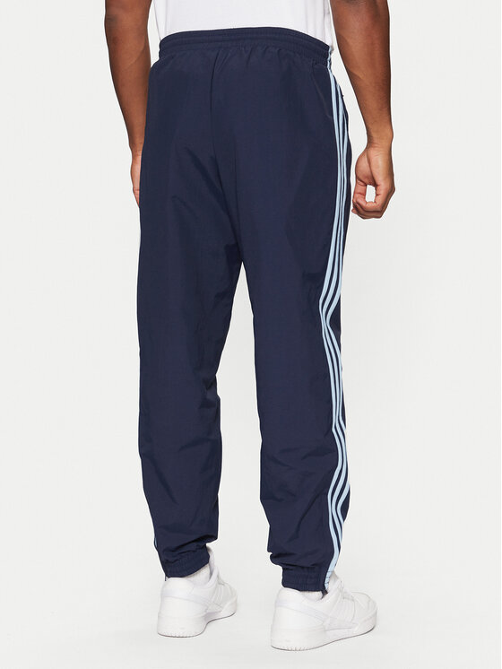 adidas adidas Pantaloni trening adicolor Firebird JP1249 Bleumarin Regular Fit