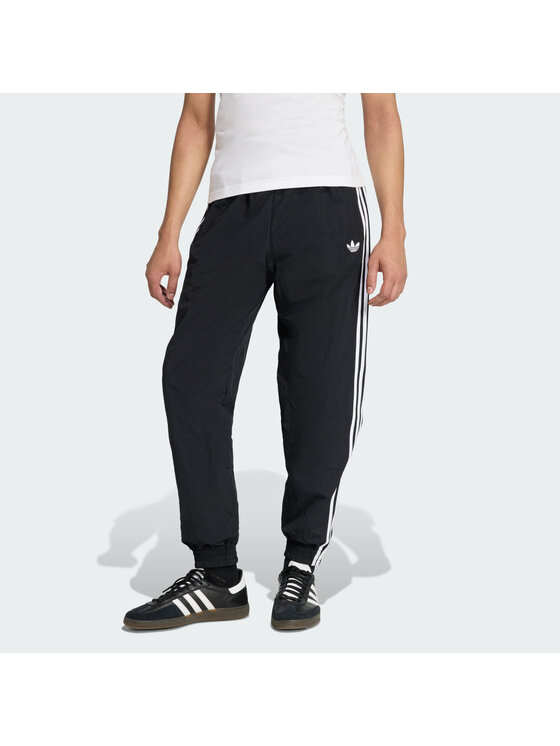 adidas adidas Pantaloni da tuta Firebird Woven KE1371 Nero Regular Fit