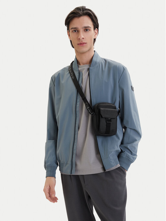 Calvin Klein Geantă crossover Webbing Strap Slim Reporter LV04D3281G Negru