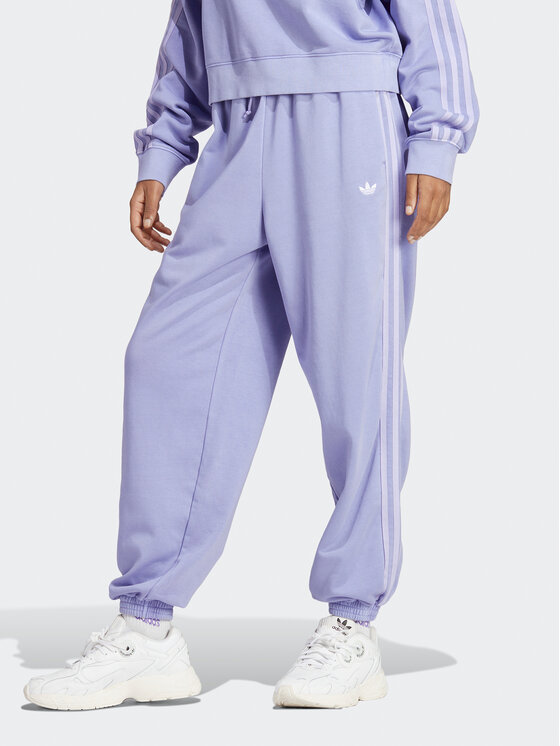 adidas Pantaloni da tuta Joggers IP7141 Viola Loose Fit Modivo