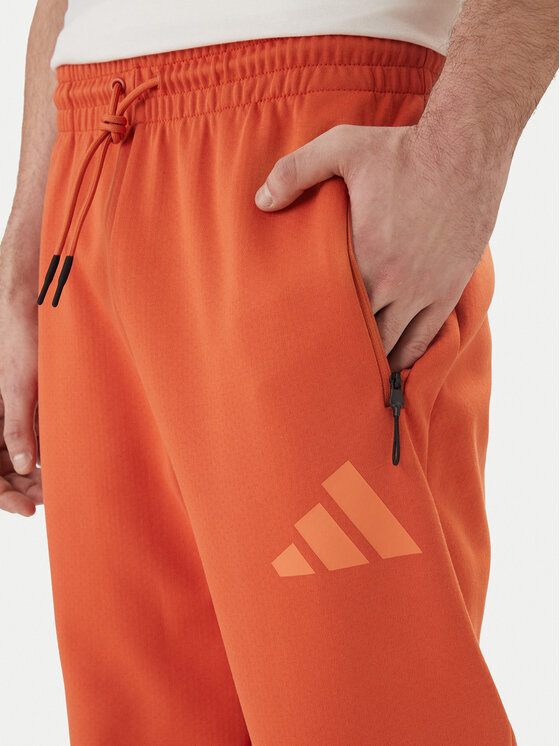 adidas adidas Долнище анцуг Z.N.E. KE4686 Оранжев Regular Fit