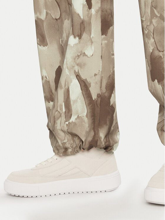 Champion Champion Παντελόνι φόρμας 117502 Μπεζ Loose Fit