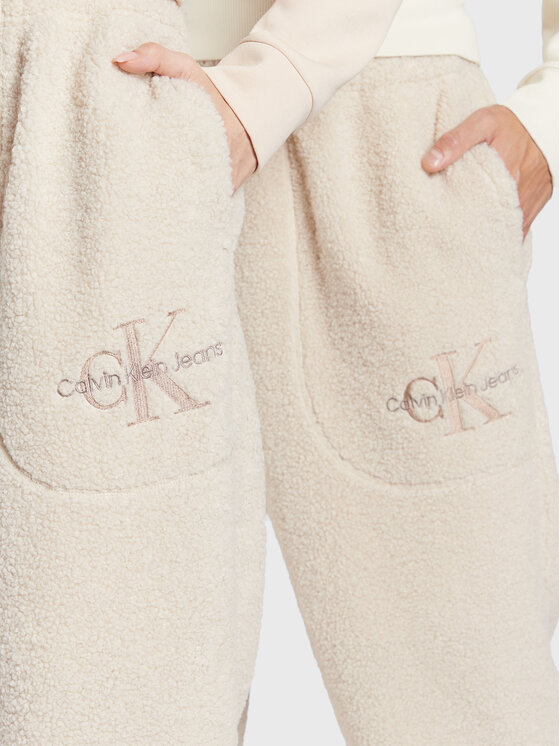 Calvin Klein Jeans Calvin Klein Jeans Bavlnené nohavice Unisex J40J400187 Béžová Regular Fit