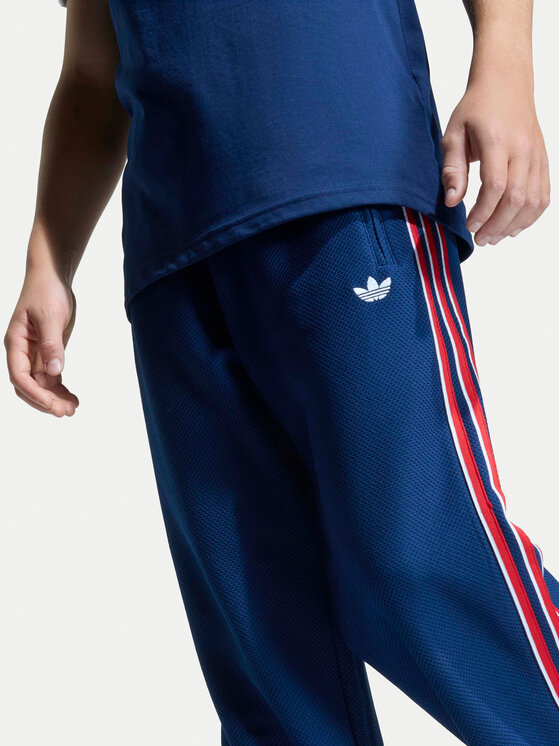 adidas adidas Спортивні штани Firebird Double Knit KD7825 Cиній Loose Fit