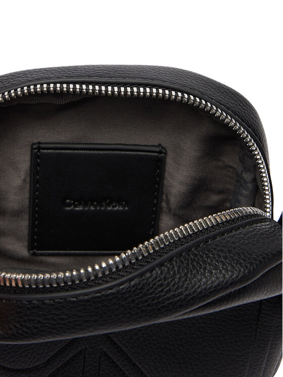 Calvin Klein Calvin Klein Brašna Emblem Aop Emboss Slim Reporter LV04D3371G Černá
