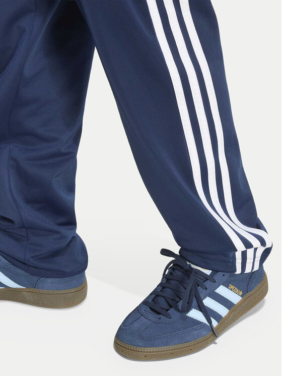 adidas adidas Melegítő alsó Firebird HZ6650 Sötétkék Regular Fit