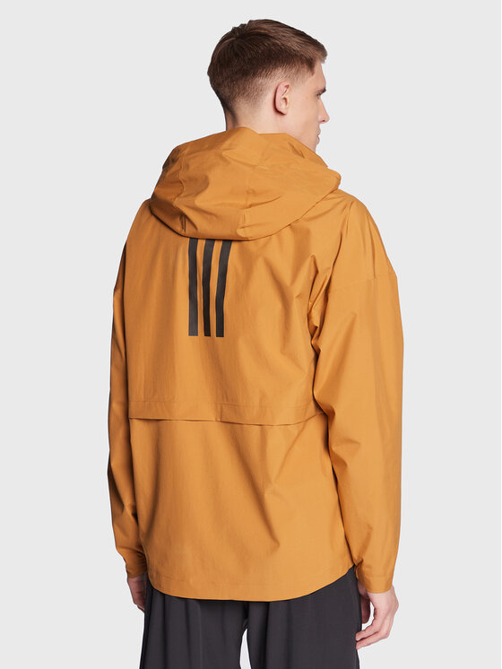 adidas adidas Преходно яке Traveer RAIN.RDY Jacket (Gender Neutral) HG6013 Бежов Regular Fit