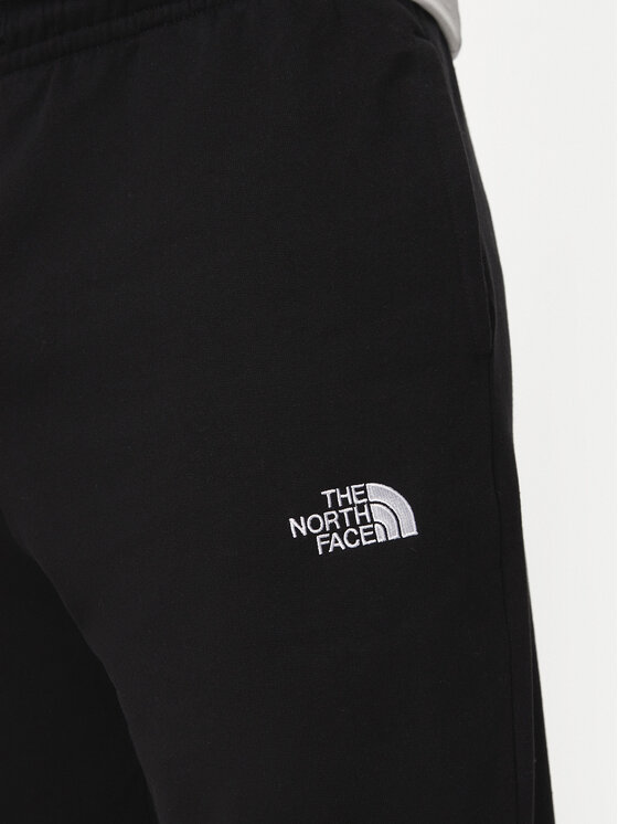 The North Face The North Face Pantaloni trening Essential NF0A8A6J Negru Relaxed Fit