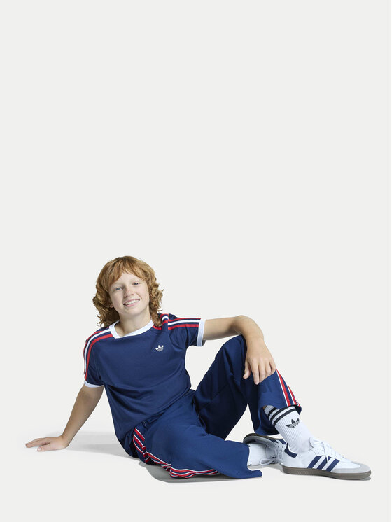 adidas adidas Долнище анцуг Firebird Double Knit KD7825 Тъмносин Loose Fit