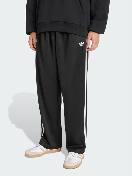 adidas adidas Spodnie dresowe ADICOLOR LOOSE Czarny Loose Fit