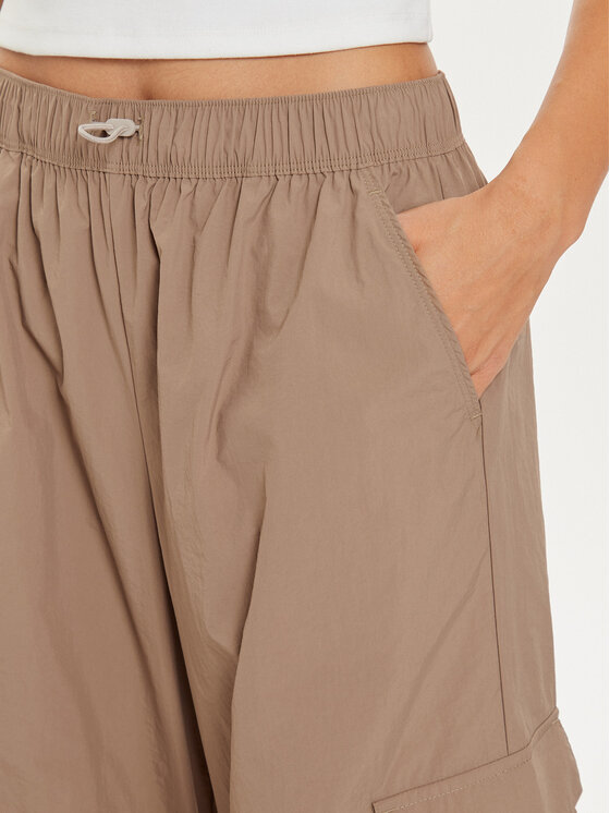New Balance New Balance Долнище анцуг WP43534 Бежов Relaxed Fit