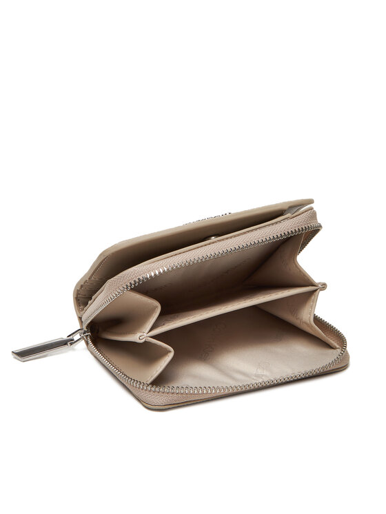 Calvin Klein Calvin Klein Mazs sieviešu maks Ck Must Aop Md Zip Around W Flap LV04F1037G Bēšs