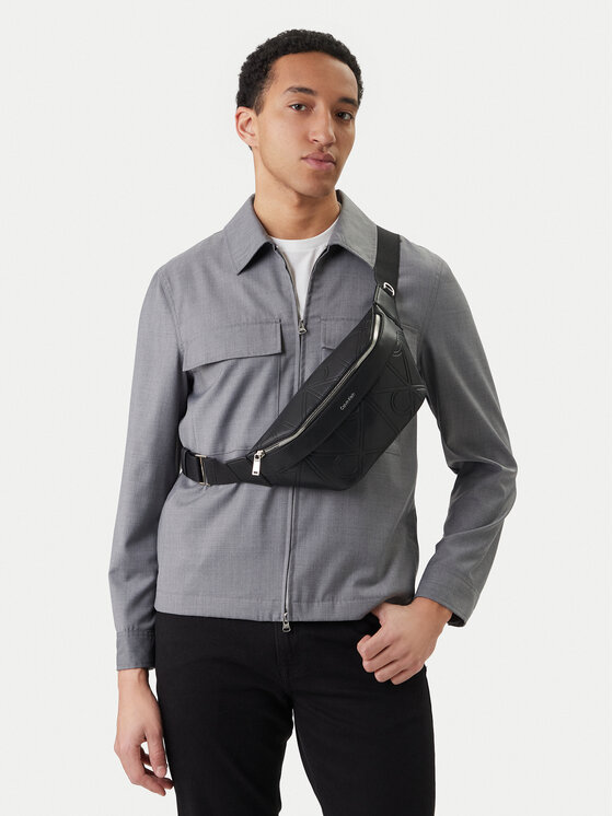 Calvin Klein Calvin Klein Torbica oko struka﻿ Emblem Aop Emboss Waistbag LV04D3332G Crna