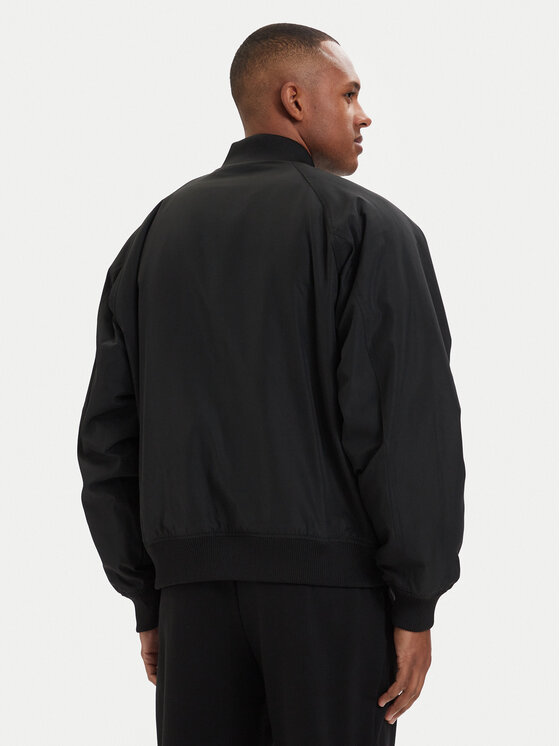 adidas adidas Bomber jakna adicolor Teamgeist KC8358 Črna Loose Fit