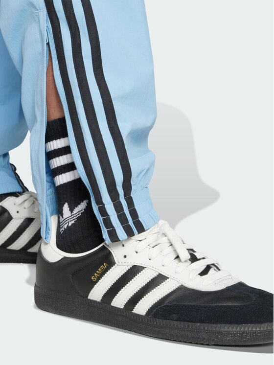 adidas adidas Spodnie dresowe Adicolor Woven Firebird Błękitny Regular Fit