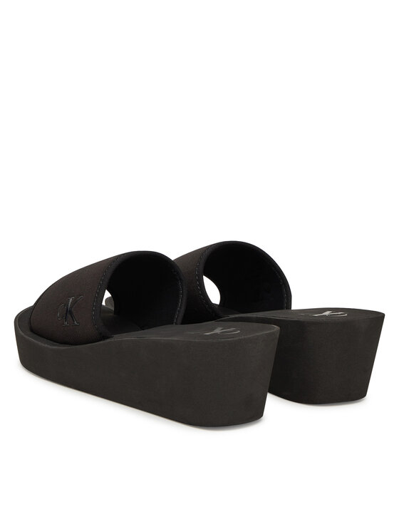 Calvin Klein Jeans Calvin Klein Jeans Шльопанці Beach Wedge Slide Canvas YW0YW01725 Чорний