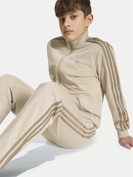 adidas adidas Sportinės kelnės Firebird HZ6652 Šviesiai smėlinė Regular Fit