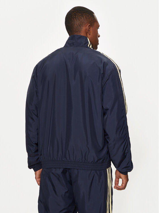 adidas adidas Demisezoninė striukė House of Tiro IW3579 Tamsiai mėlyna Loose Fit