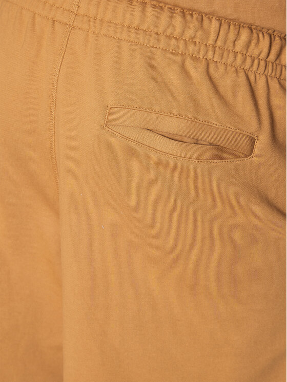 New Balance New Balance Športne kratke hlače Athletics MS23550 Oranžna Relaxed Fit