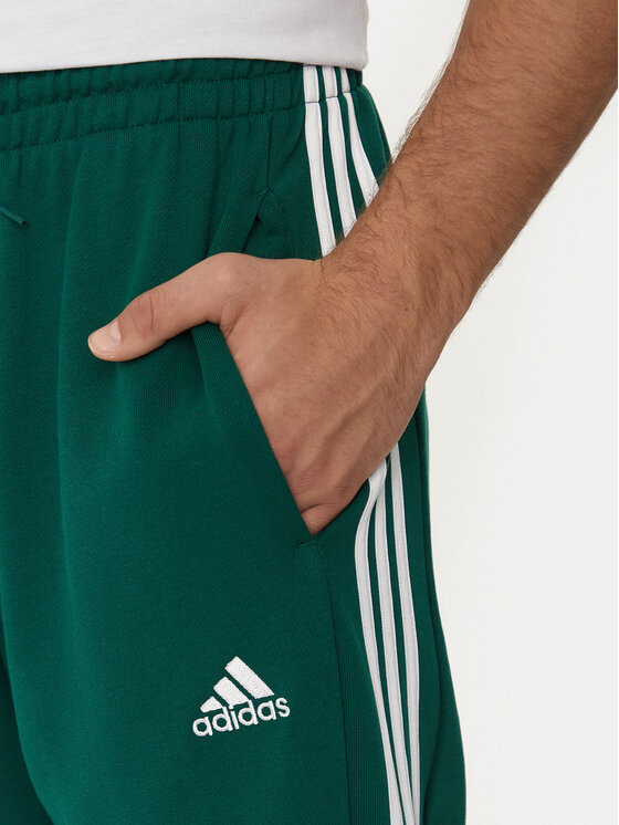 adidas adidas Spodnji del trenirke Essentials IS1392 Zelena Regular Fit