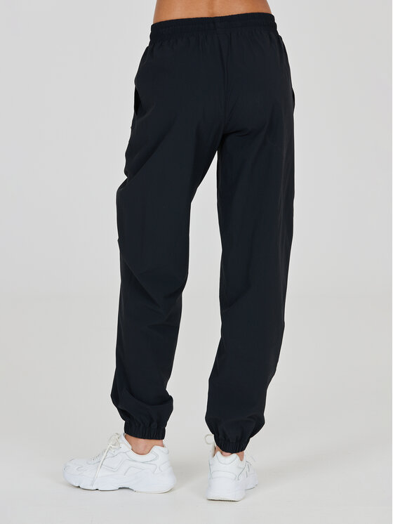 Athlecia Athlecia Spodnji del trenirke Hero W Track Pants EA233336 Črna Regular Fit